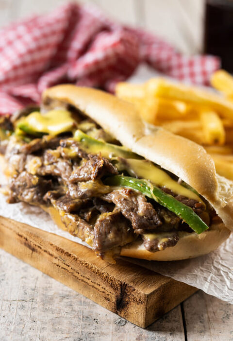 philly-cheesesteak-sandwich-wooden-table-traditional-philadelphia-sandwich